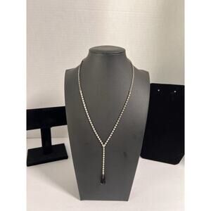 Y-drop necklace featuring a silver-tone rhinestone chain
